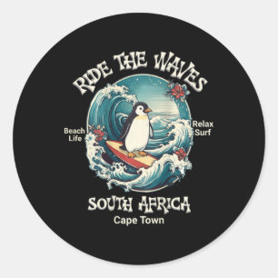 Sticker Rond Manchot surfant sur les vagues Afrique du Sud Cape