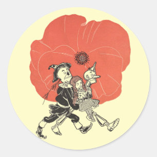 Sticker Rond Merveilleux Magicien d'Oz, Dorothy avec des fleurs