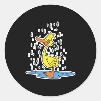 Sticker Rond mignon canard à flaque sous la pluie