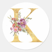 Monogramme or lettre K avec fleurs
