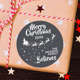 Sticker Rond Noël Père Noël vacances pour les rennes de traînea