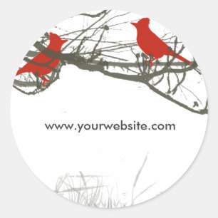 Sticker Rond Oiseau cardinal rouge dans les branches des arbres
