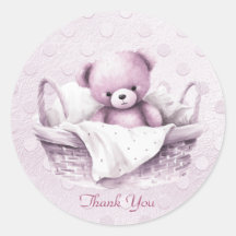 Ours en peluche rose dans l'autocollant du panier