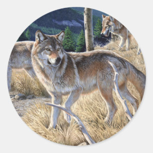 Sticker Rond Pack de loups dans la peinture forestière