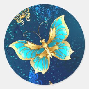 Sticker Rond Papillons d'or sur un Arrière - plan bleu