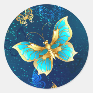 Sticker Rond Papillons d'or sur un Arrière - plan bleu