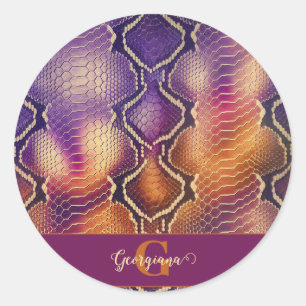 Sticker Rond Peau de serpent chatoyante en violet et or monogra