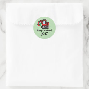 Sticker Rond Pelleteuse rouge mignonne avec petit arbre de Noël