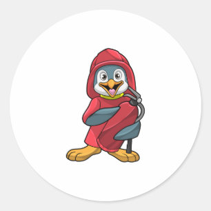 Sticker Rond Penguin comme pompier avec Extinguisher