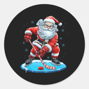 Sticker Rond Père Noël de Noël drôle jouant au hockey sur glace