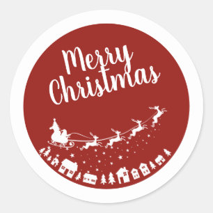 Sticker Rond Père Noël silhouette de traîneau volant au-dessus 