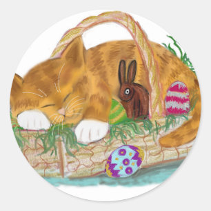 Sticker Rond Petit somme de chat dans un panier de Pâques