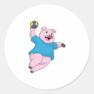 Sticker Rond Pig en tant que joueur de handball avec Handball