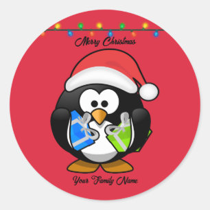 Sticker Rond Pingouin Arrière - plan rouge tenant des cadeaux d