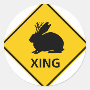 Sticker Rond Signe de route de croisement de Jackalope