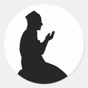 Sticker Rond Silhouette d'un homme de prière musulman