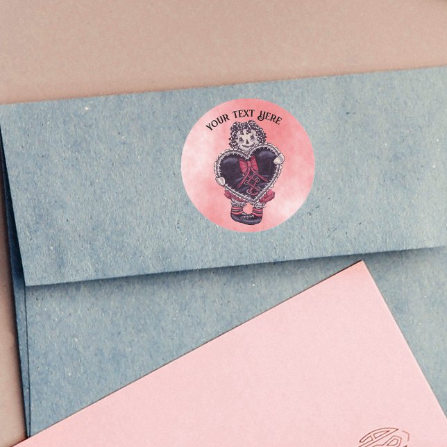 Sticker Rond Spooky Valentine Doll With Black Heart on Pink Red (Valentine Goth rag doll with black lace trimmed heart red bow on pink red round sticker.)