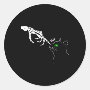 Sticker Rond Squelette Halloween drôle sur le nez d'un chat