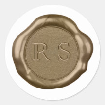 Sticleur de cire d'or monogramme sur blanc,