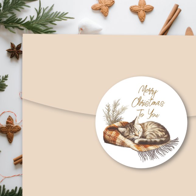 Sticker Rond Sweet Kitten dormant sur une couverture chaude Noë (Créateur téléchargé)