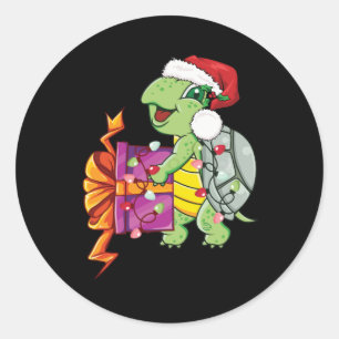 Sticker Rond Tortue de mer portant le chapeau de Père Noël Joye
