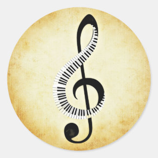 Sticker Rond Touches de piano sur un Clef de musique
