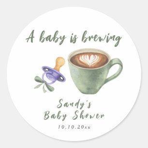 Sticker Rond Un bébé prépare une tétine à café Bébé Shower