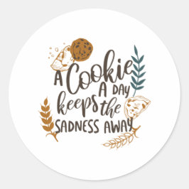 Sticker Rond Un biscuit par jour garde la tristesse blanche