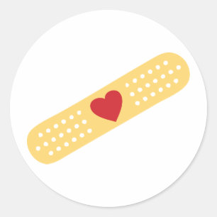 Sticker Rond Un pansement Avec Un Coeur Rouge