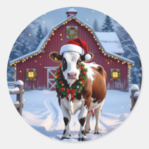 Sticker Rond Une vache festive à Santa Hat Pays Noël