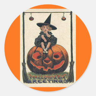 Sticker Rond Vintage fille d'Halloween sur Jack o'Lantern