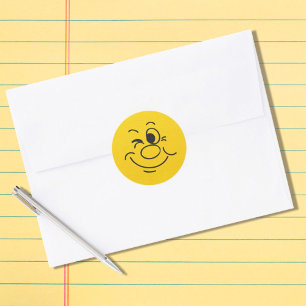 Sticker rond visage souriant drôle