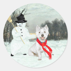 Sticker Rond Westie d'hiver avec un bonhomme de neige