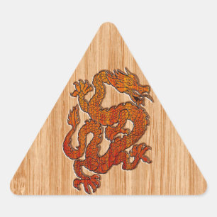 Sticker Triangulaire Un dragon rouge sur Bambou comme