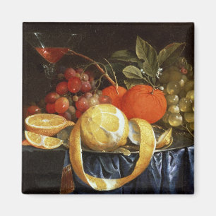 Stillleben der Trauben, der Orangen und der Magnet