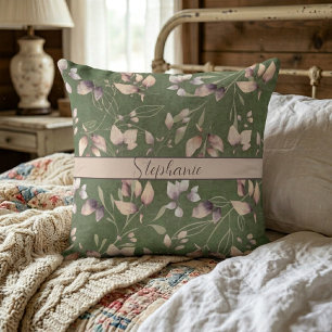 Stilvolle Blätter aus Rosa und Goldstein auf Grün Kissen