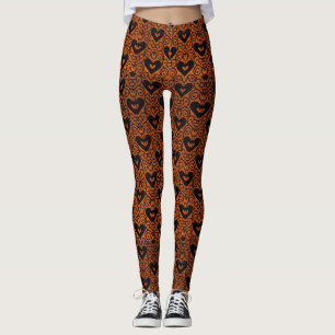 Stilvolle Rollen und schwarze Herzen auf Kupfer Leggings