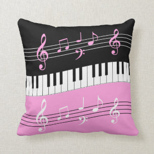 Stilvolle rosa Schwarz-weiße Klavier-Schlüssel u Kissen