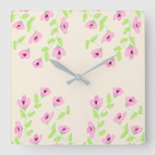 Stilvolle Uhr am Platz mit rosafarbener Blüte