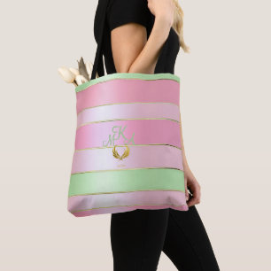 Stilvolles, pastellrosa und grün monogrammiertes tasche