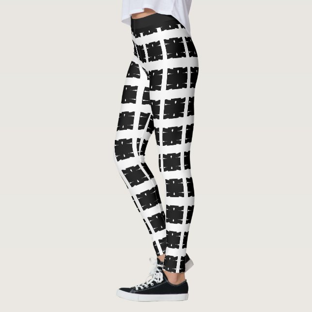 Stilvolles Schwarz-Weiß-Muster Leggings (Links)
