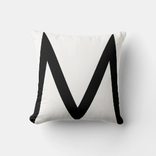 Stilvolles schwarzes Monogramm auf weißem Kissenbe Kissen