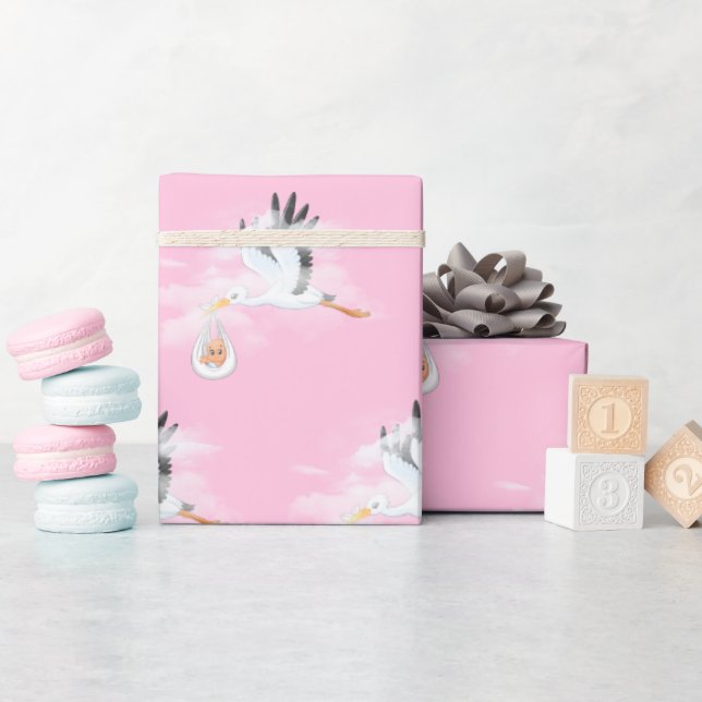 Storch und Baby auf rosa Geschenkpapier (Babyparty)
