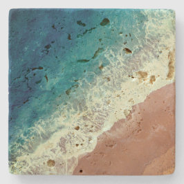 Strand mit Meerwasser und sommerlichen Badestrände Steinuntersetzer