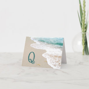 Strand mit Monogrammbuchstabe Q