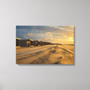 Strandhütten bei Sonnenuntergang an der niederlä Leinwanddruck