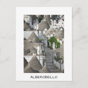 Straße mit Trulli Häusern in Alberobello, Puglia Postkarte