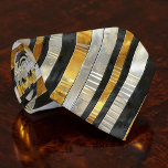 Striped Gold, Black, Silver Necktie Krawatte<br><div class="desc">This stylish necktie features a classic striped pattern in rich gold, sophisticated black, and elegant silver. Perfect for adding a touch of modern flair to any outfit, whether it's for a business meeting, a special event, or simply to elevate your everyday look. The high-quality fabric ensures a comfortable and durable...</div>