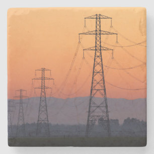 Strommasten bei Sonnenuntergang Steinuntersetzer