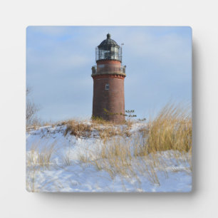 Sturdy Lighthouse an einer Felsküste im Winter Fotoplatte